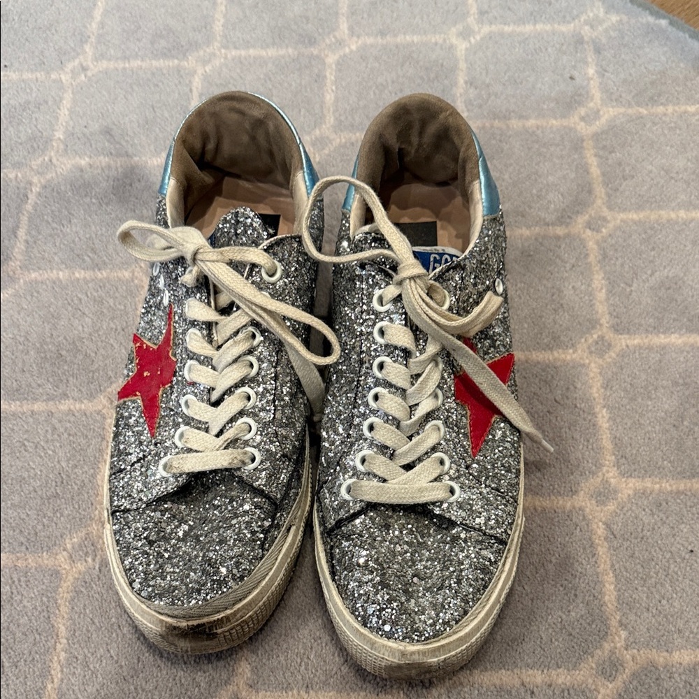 Golden Goose women’s Silver Glitter Sneakers with Red Star Accent